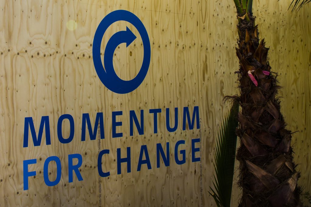Sign-Momentum for Change